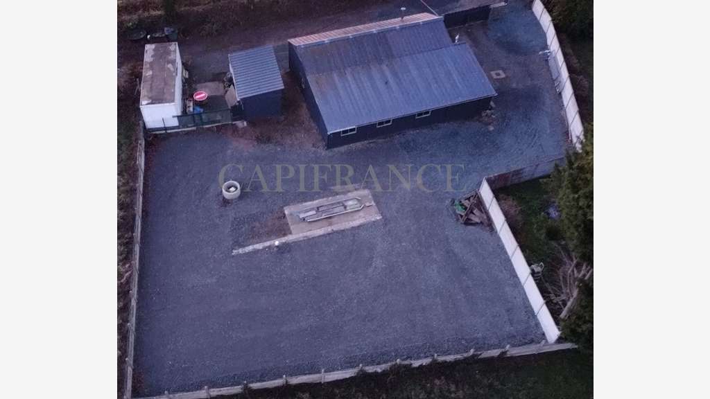 Local artisanal 140m² + Terrain 700m² Accès RN12