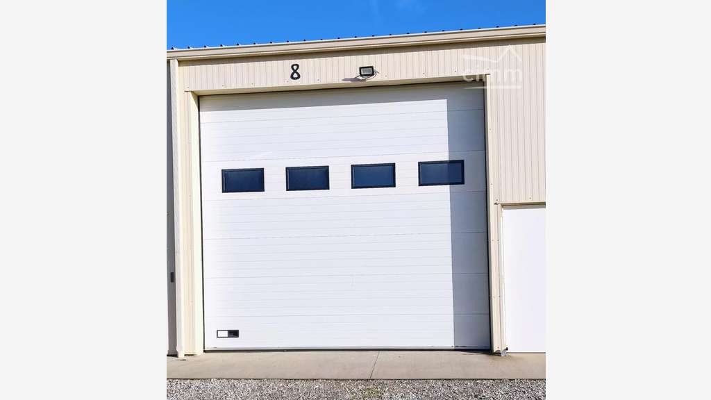 A louer grand box de 100m² neuf à Alixan