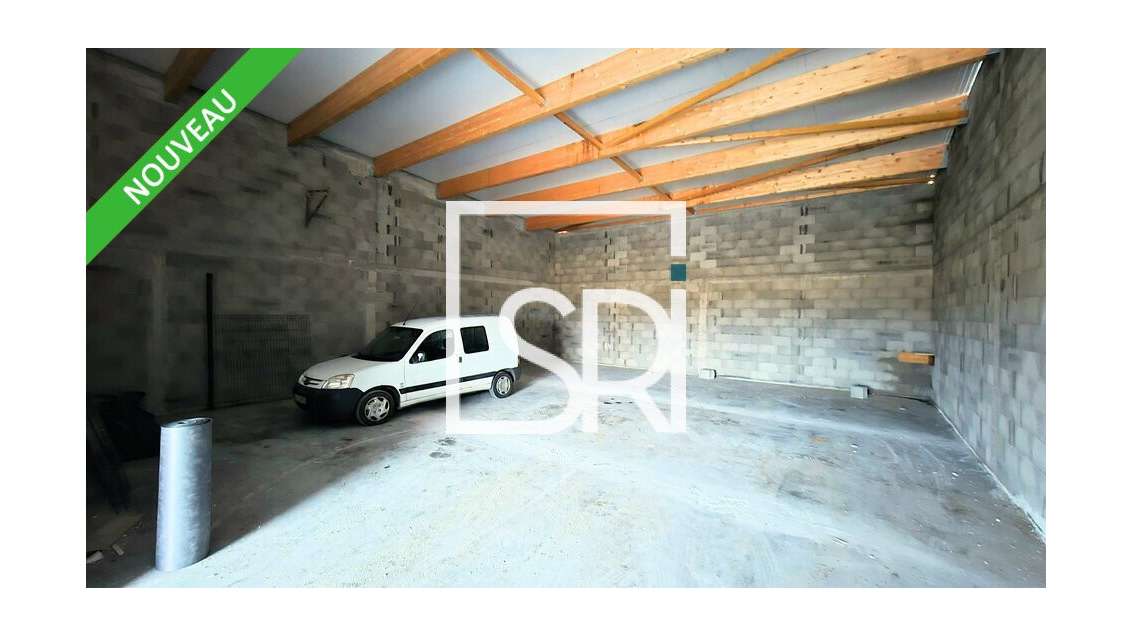 Entrepôt avec bureau 189m² à louer à Aulnat