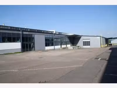 Location d'une entrepôt/atelier d'une surface de 
