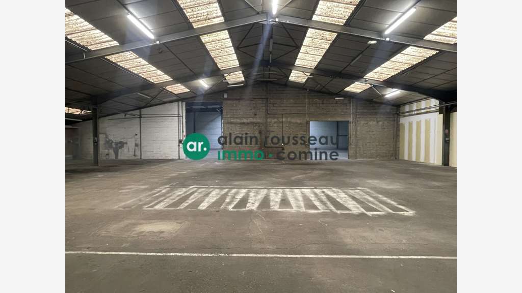 A louer local activité 1520m² zone ind. Écouflant