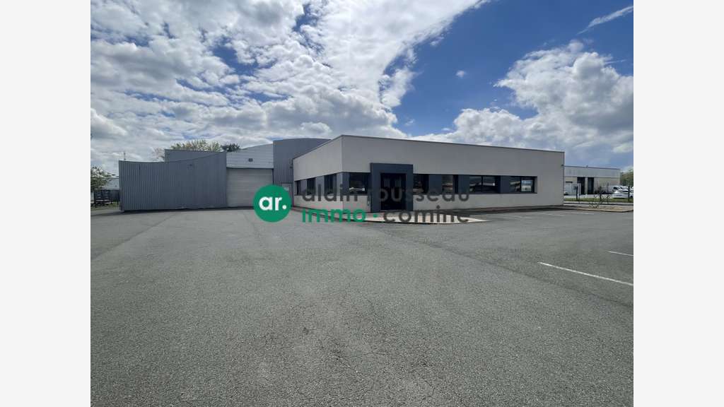 A louer local activité 1520m² zone ind. Écouflant