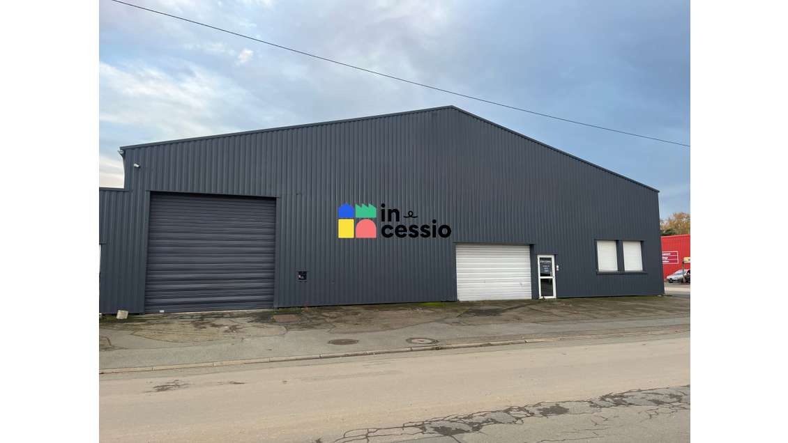 A louer local activité 600m² St-Pavace zone indus.