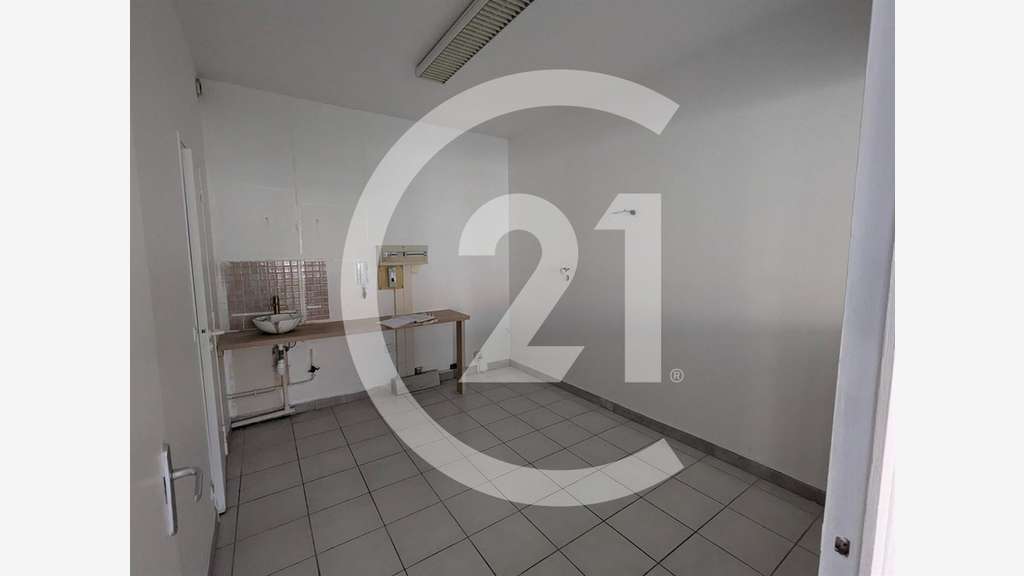 Location local commercial proche gare de Romans 