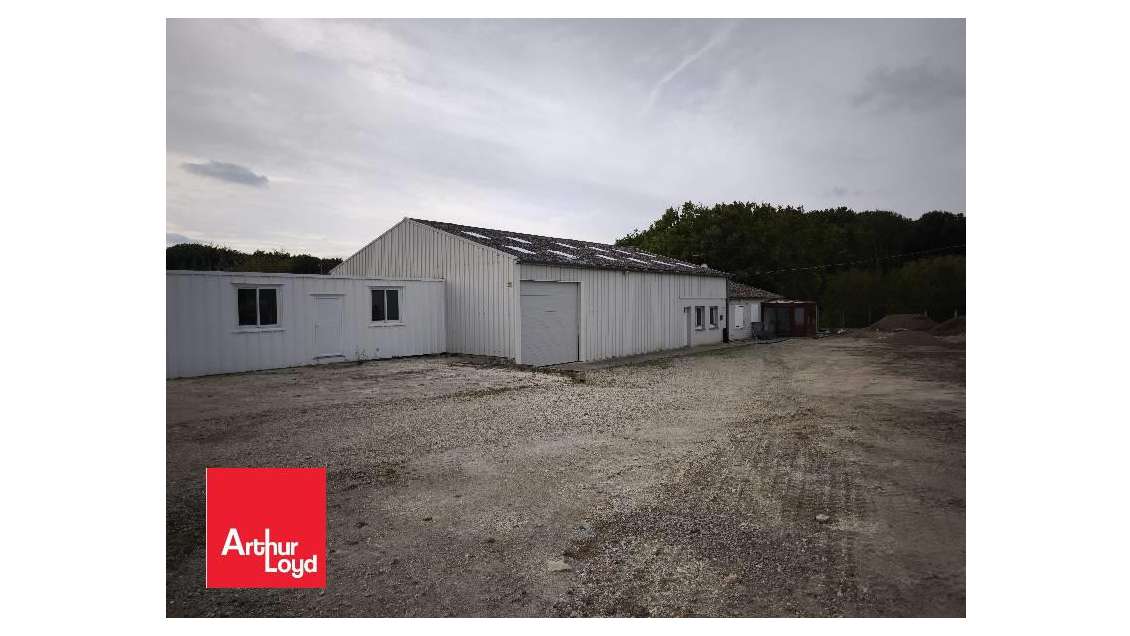 A louer locaux 460l² ZA Nogent le Phaye N10