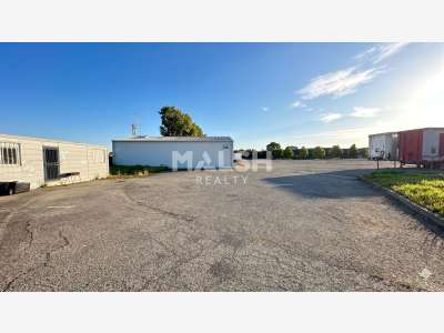 Terrain aire stockage goudronnée 19218m² St Priest