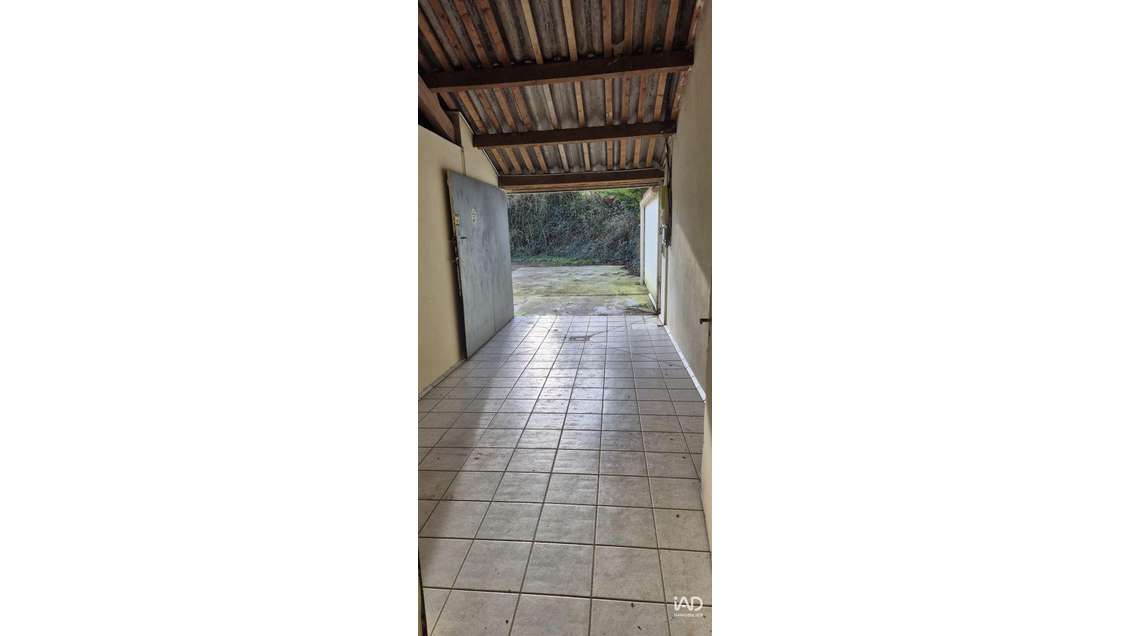 Vente  local professionnel 115m² à Montigné