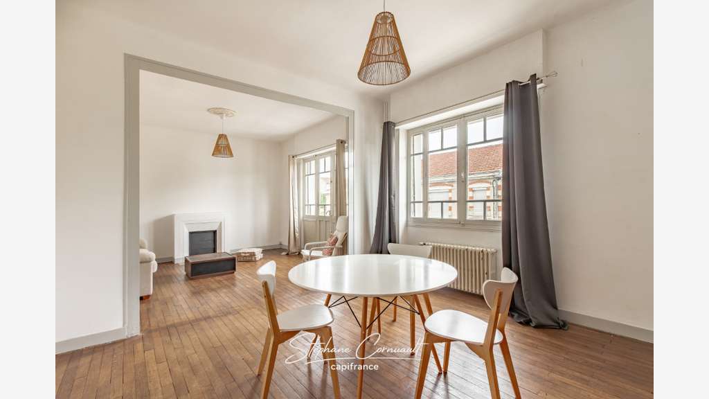 Immeuble de rapport de quatre appartements proche