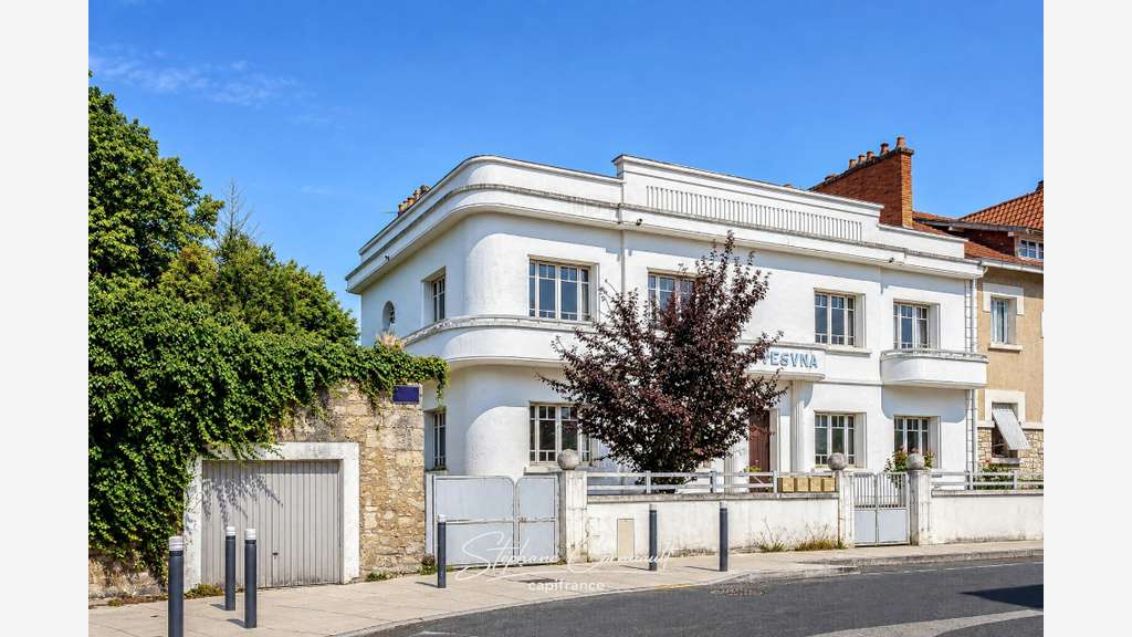 Immeuble de rapport de quatre appartements proche