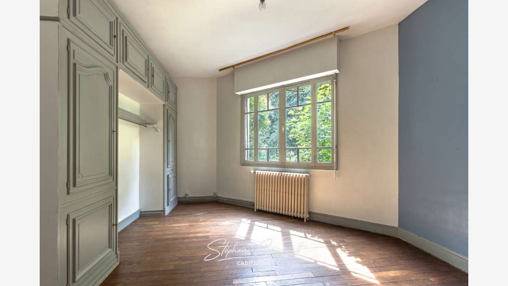 Immeuble de rapport de quatre appartements proche