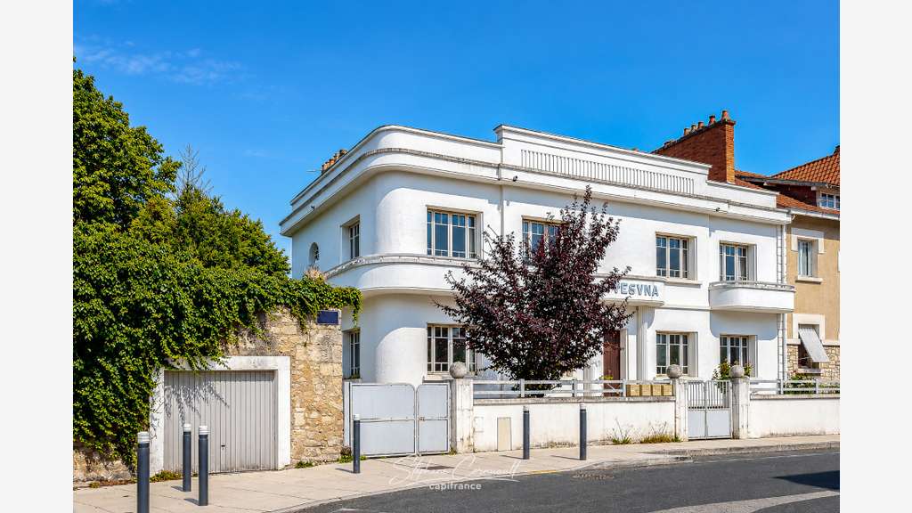 Immeuble de rapport de quatre appartements proche