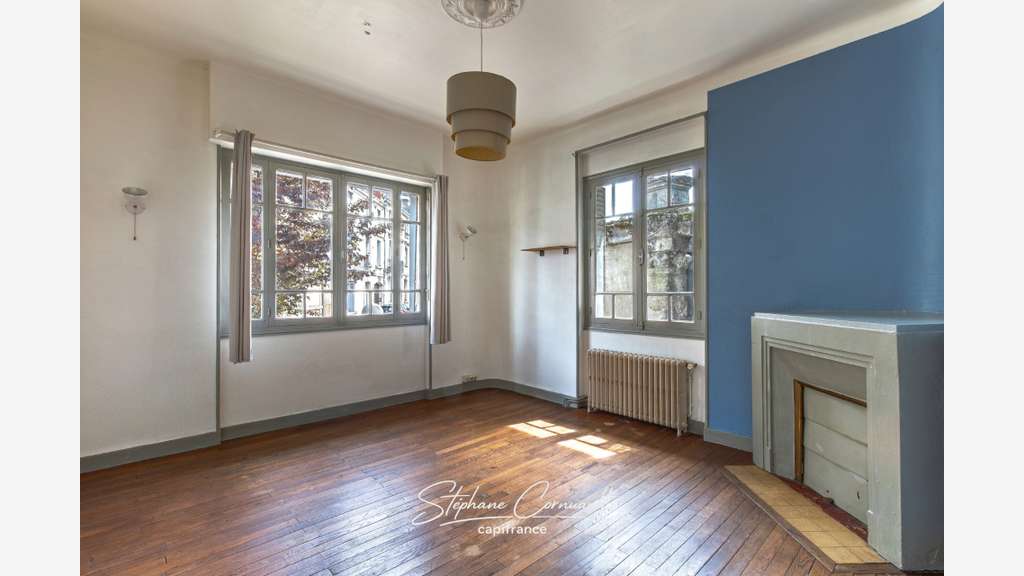 Immeuble de rapport de quatre appartements proche