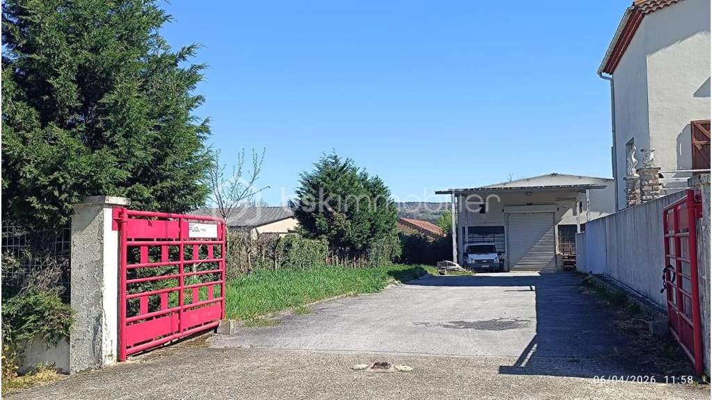 Vente bâtiment+garages+terrain à Aussillon