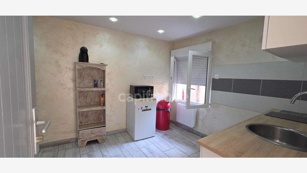 Immeuble de rapport - Local commercial et studio