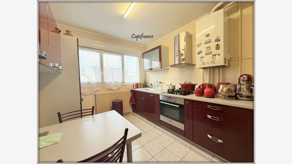 DRANCY - IMMEUBLE 2 APPARTEMENTS F3 + GARAGES +