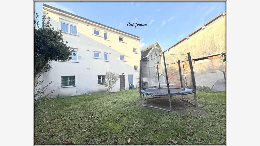 DRANCY - IMMEUBLE 2 APPARTEMENTS F3 + GARAGES +