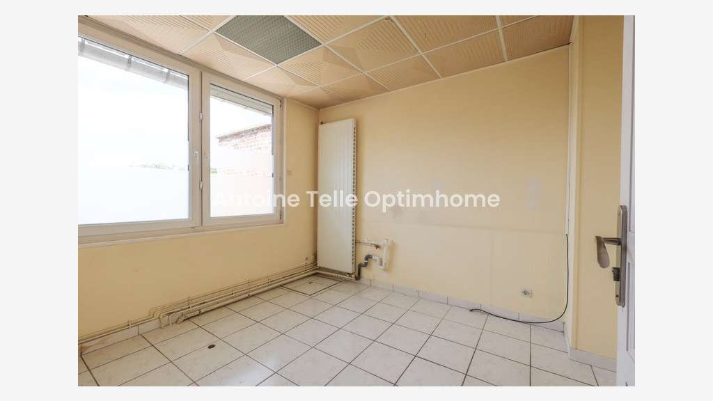 Immeuble de rapport 4 logements + places de