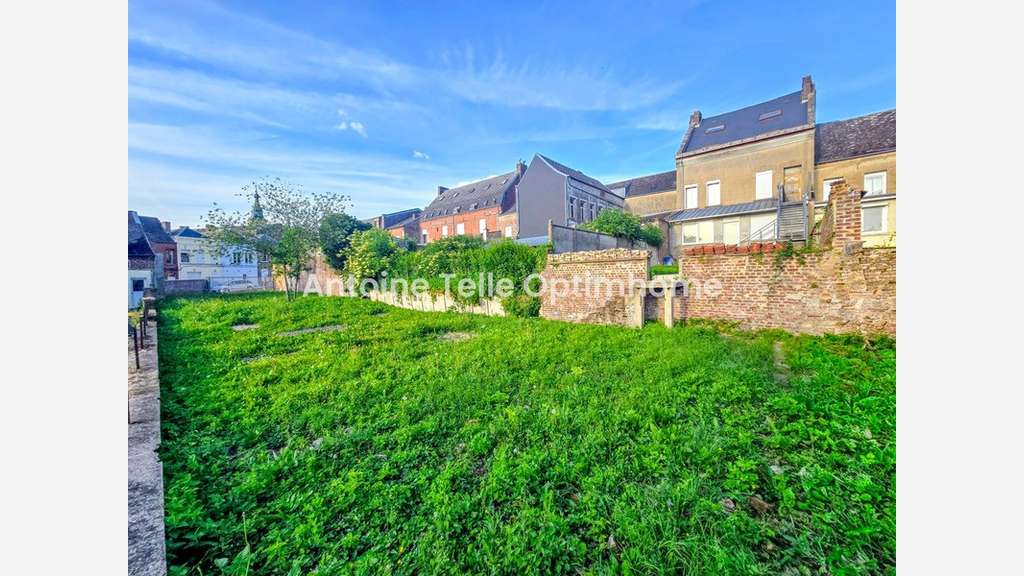 Immeuble de rapport 4 logements + places de
