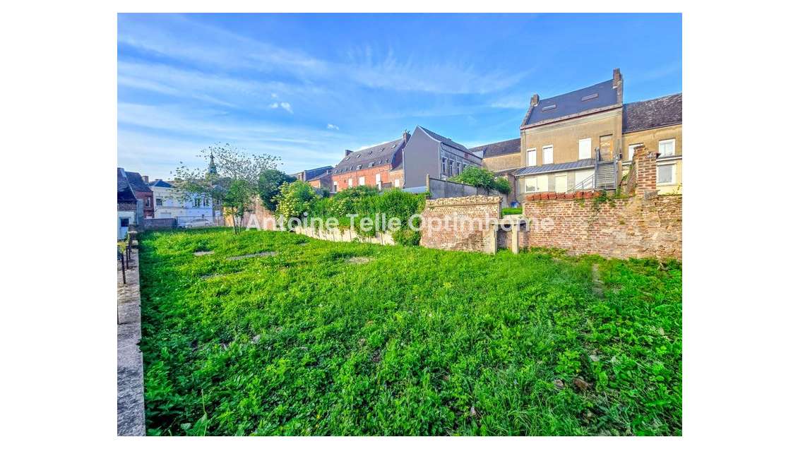 Immeuble de rapport 4 logements + terrain à batir