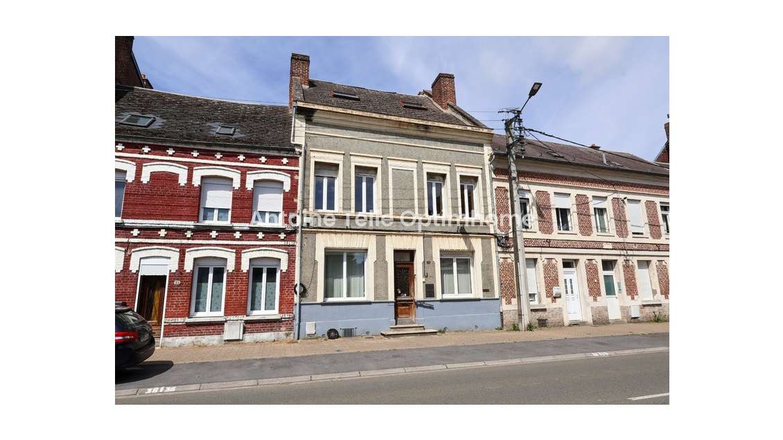 Immeuble de rapport 4 logements + terrain à batir 