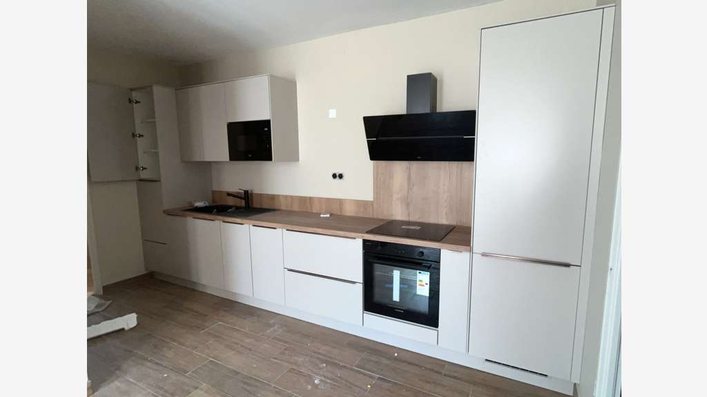 Immeuble avec 4 appartements et un garage à 