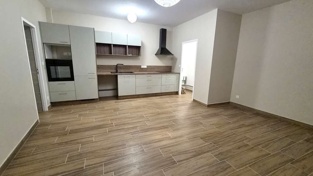Immeuble avec 4 appartements et un garage à 