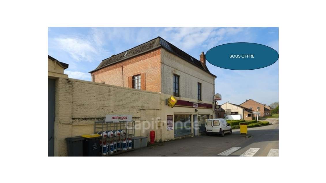 Immeuble avec commerce à vendre à Plomion