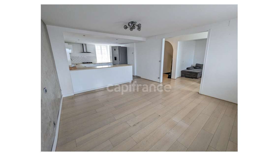 ? Duplex T5 de 110 m² avec revenu locatif