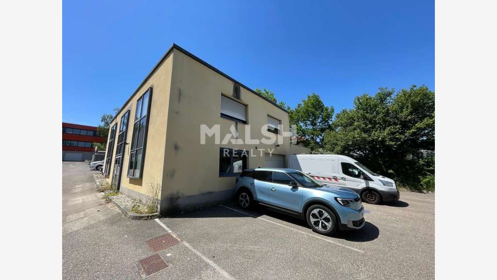 Local 450m² avec bureaux climatisés à Champagne