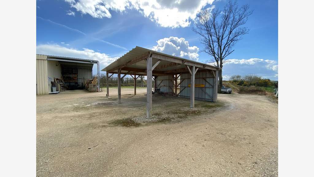 Vente entrepôt 225m² avec grand terrain à Droisy