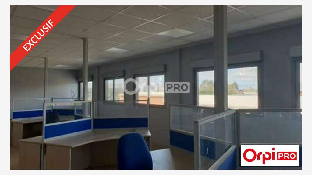 AV bâtiment de 843m² en partie loué à Alixan