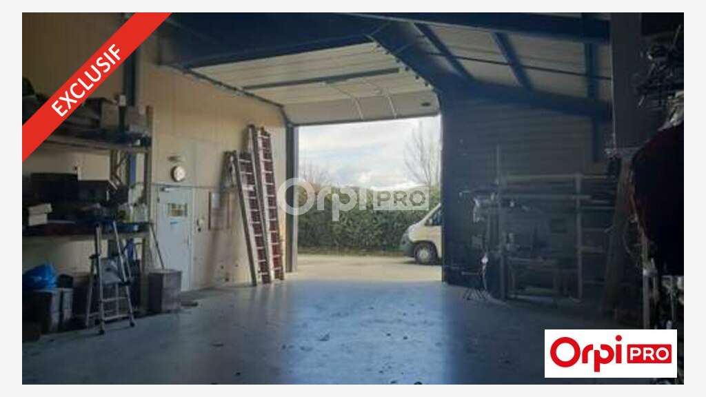 AV bâtiment de 843m² en partie loué à Alixan
