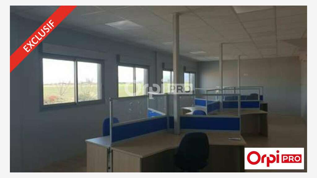 AV bâtiment de 843m² en partie loué à Alixan