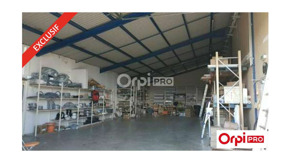 AV bâtiment de 843m² en partie loué à Alixan