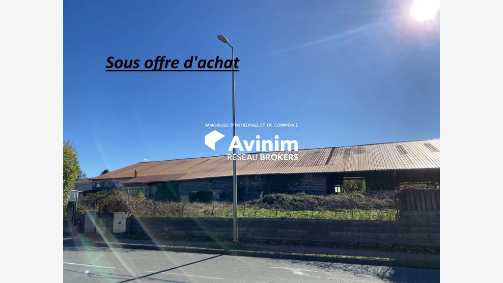 Bâtiment de + 2300m² sur parcelle 8900m² Chignat