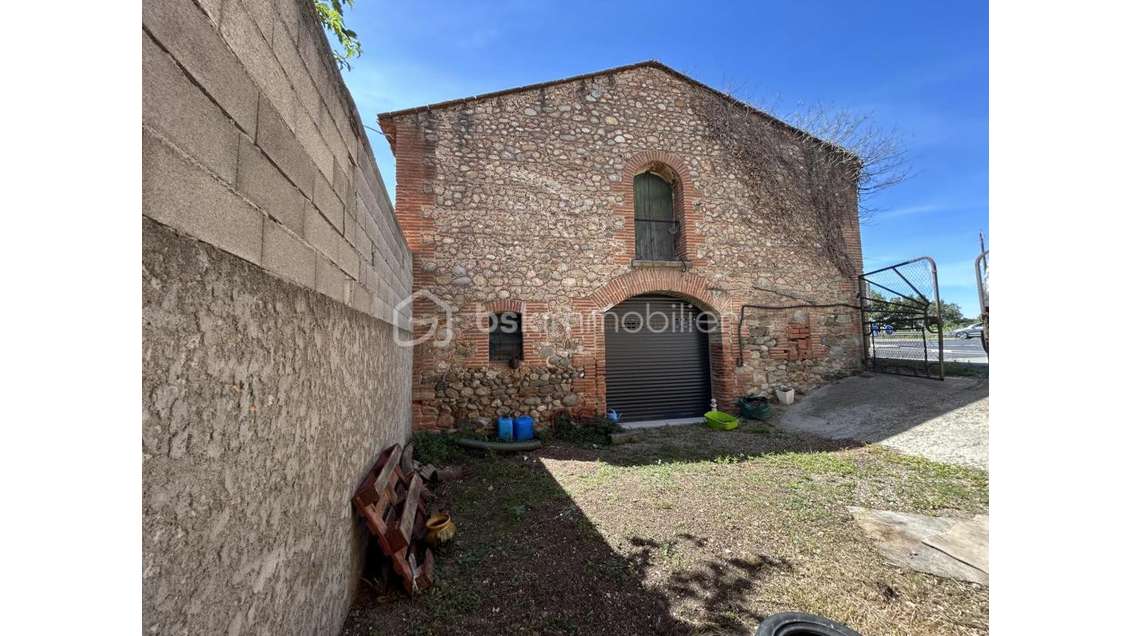 Vente local de stockage 120m² parking à Bages