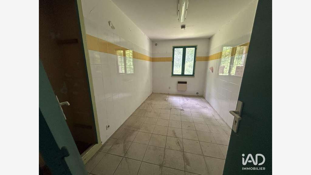 Vente local commercial 140m² à Bielle