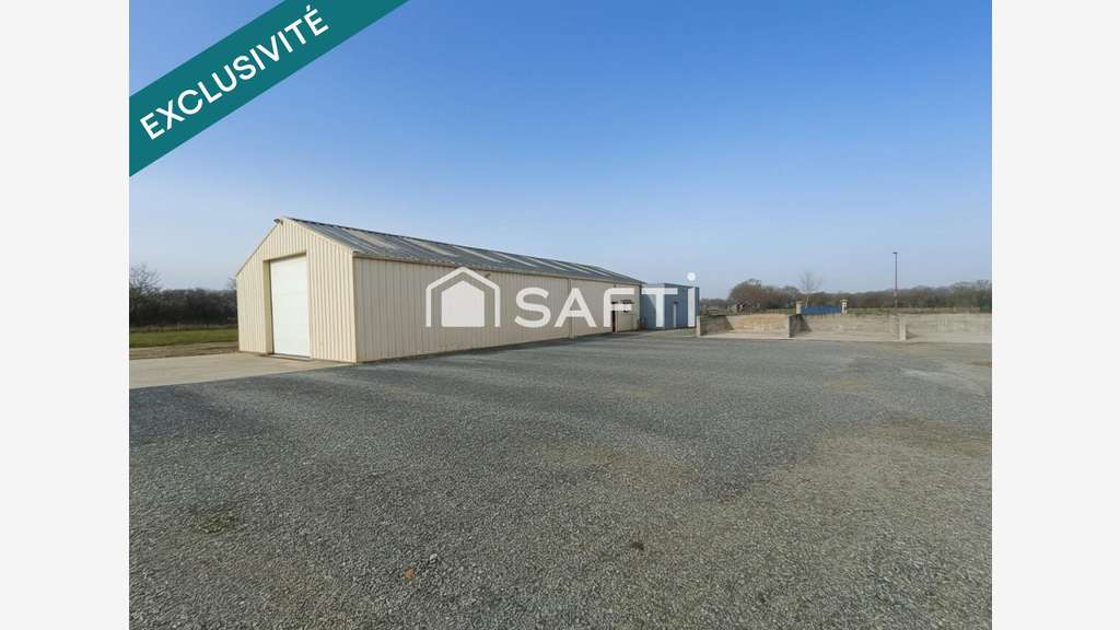 Local 370m² sur terrain de 2544m² ZA de Jans