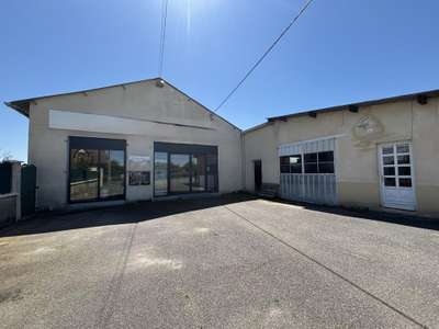Vente ancien garage avec magasin au Bouchaud