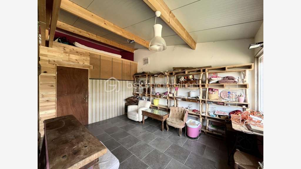Local (possibilité habitation) avec station de