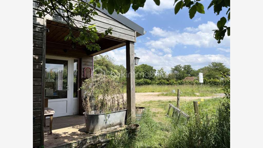 Local (possibilité habitation) avec station de
