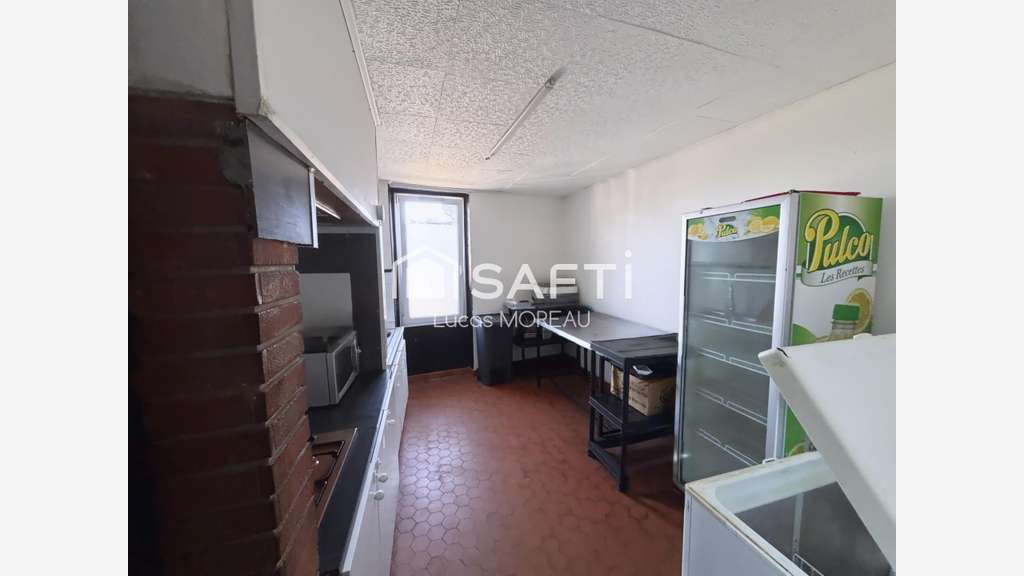 Immeuble de rapport de 2 locaux et un plateau R+1