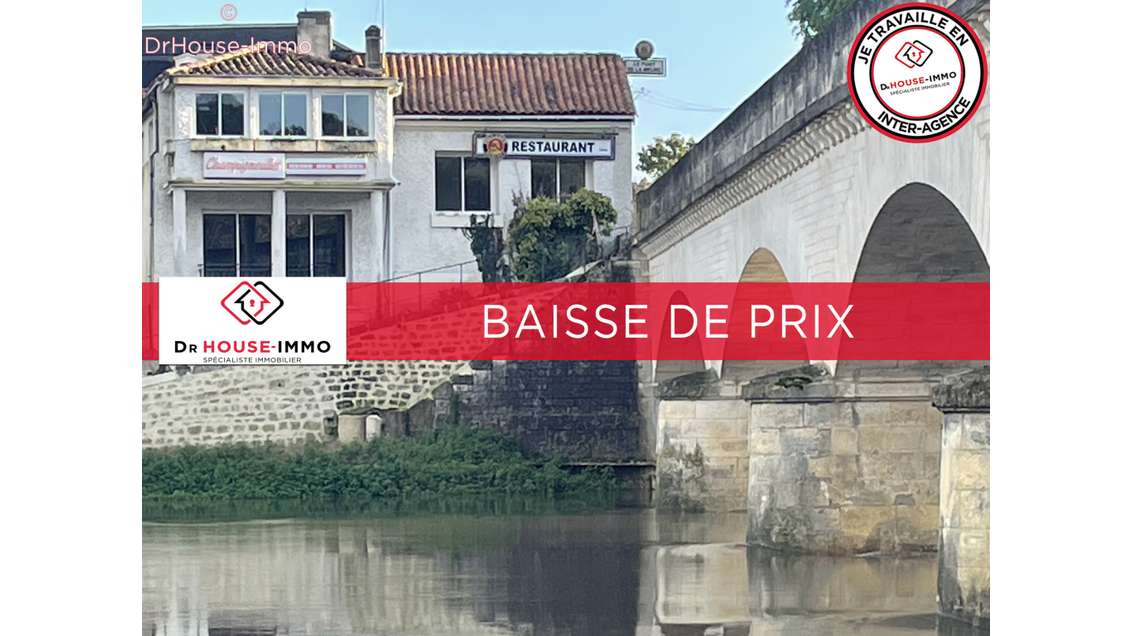 Immeuble à usage de restaurant bord Charente