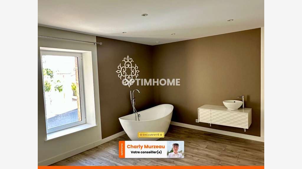 AV local commercial 100m² centre St-Malô-du-Bois