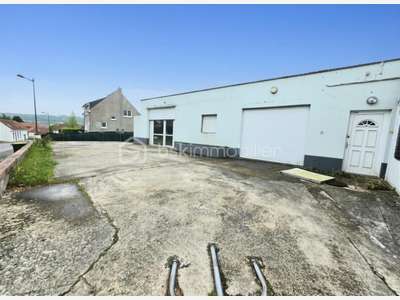 AV local commercial 100m² avec stationnements 62