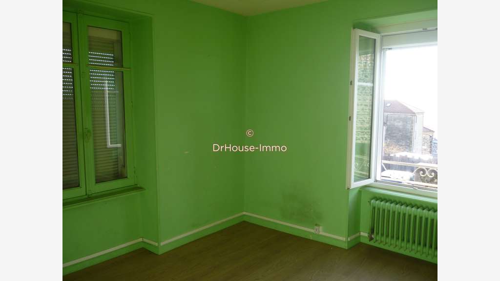 Vente immeuble avec commerce 125m² et appartement