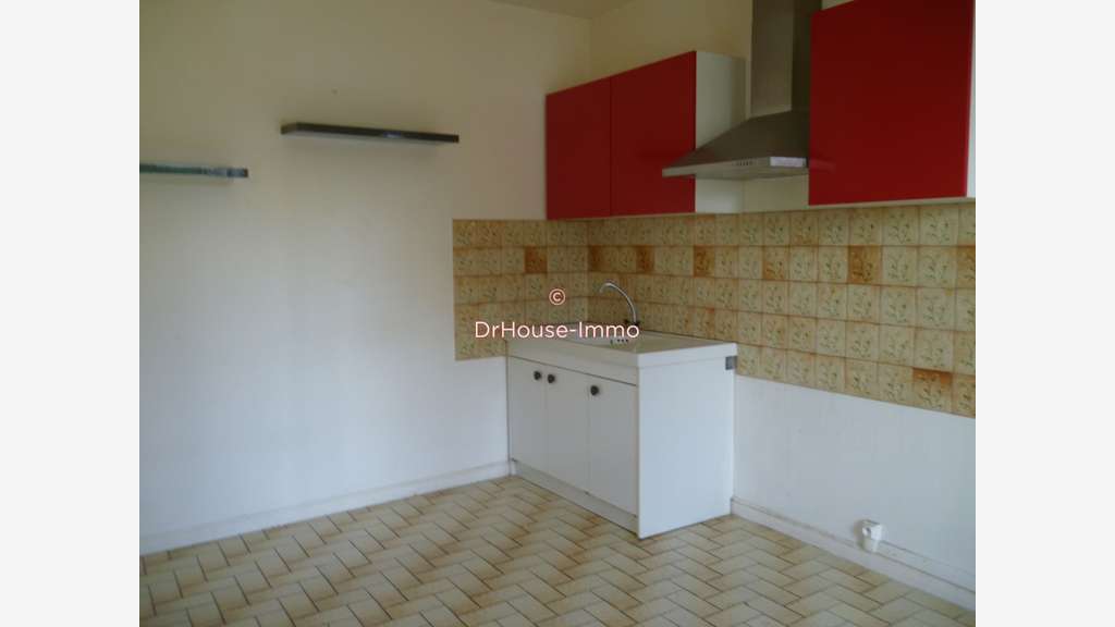Vente immeuble avec commerce 125m² et appartement