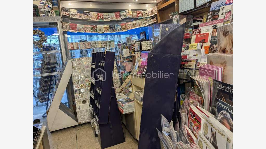 Vente librairie + appart et parking Paris 75015
