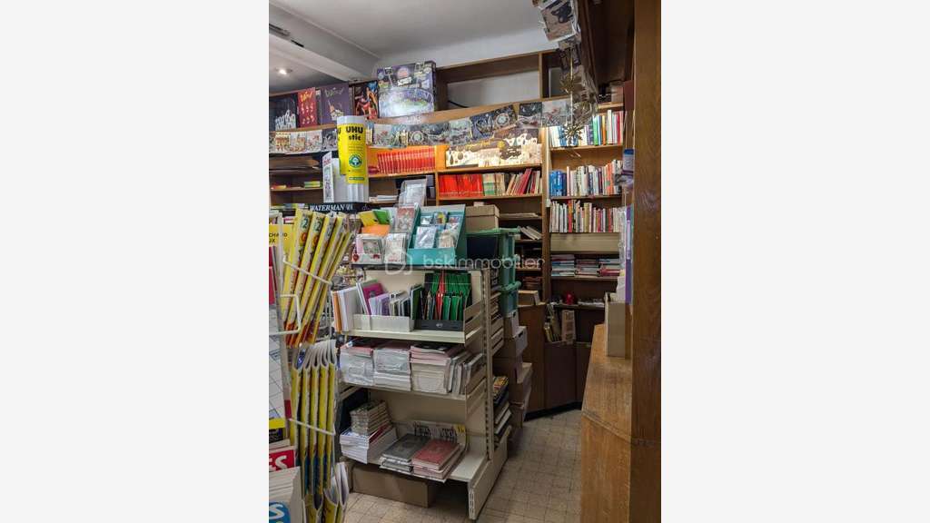 Vente librairie + appart et parking Paris 75015
