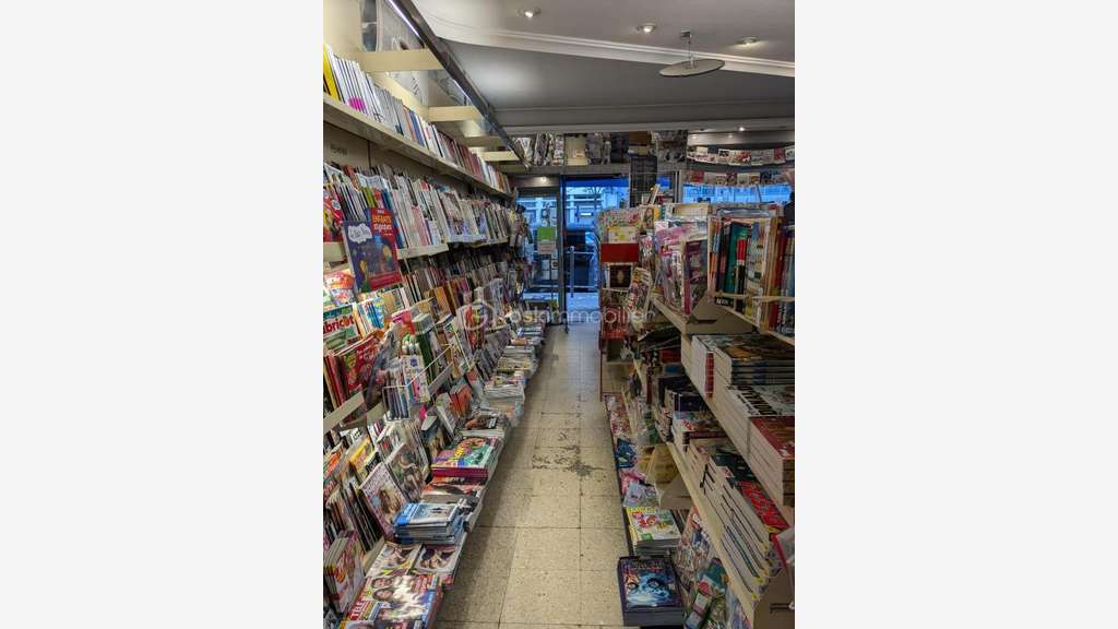 Vente librairie + appart et parking Paris 75015